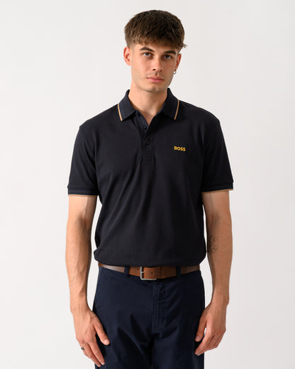model wearing a BOSS Green Paddy Mens Cotton-Piqué Polo Shirt with Contrast Logo in Dark Blue 401