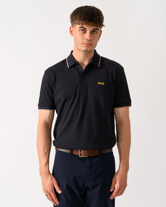 model wearing a BOSS Green Paddy Mens Cotton-Piqué Polo Shirt with Contrast Logo in Dark Blue 401