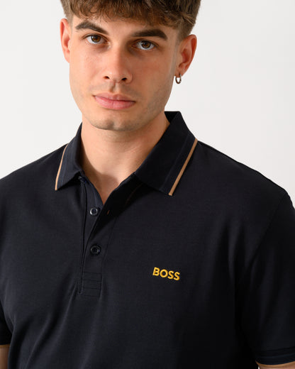 close up shot of a model wearing a BOSS Green Paddy Mens Cotton-Piqué Polo Shirt with Contrast Logo in Dark Blue 401