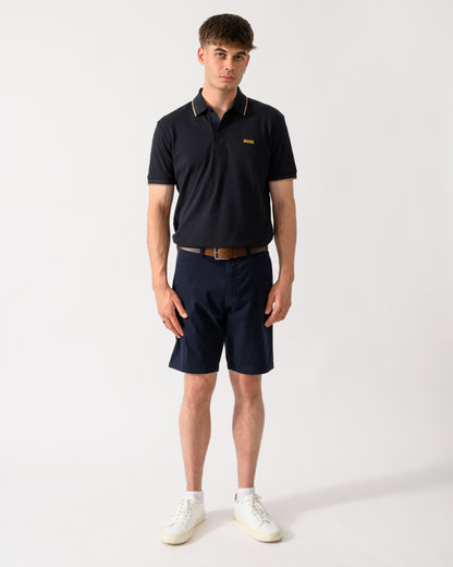 full length shot of a model wearing a BOSS Green Paddy Mens Cotton-Piqué Polo Shirt with Contrast Logo in Dark Blue 401