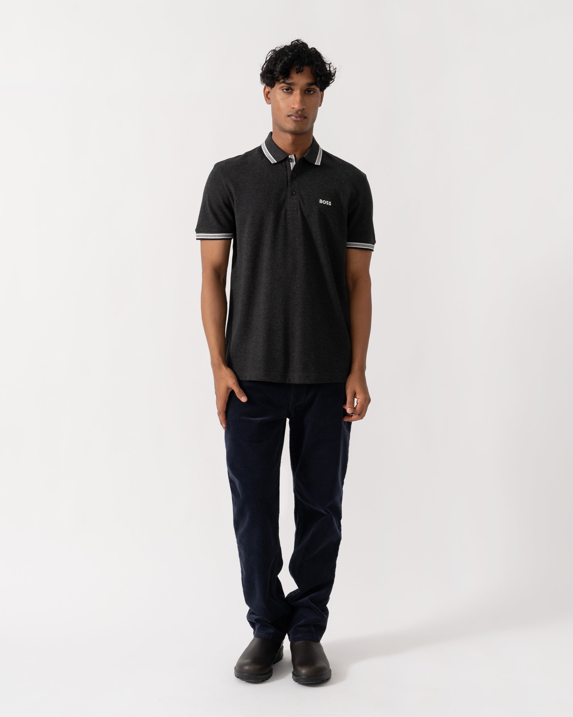 Man wearing BOSS Green Paddy Mens Cotton-Piqué Polo Shirt with Contrast Logo - Dark Grey 022