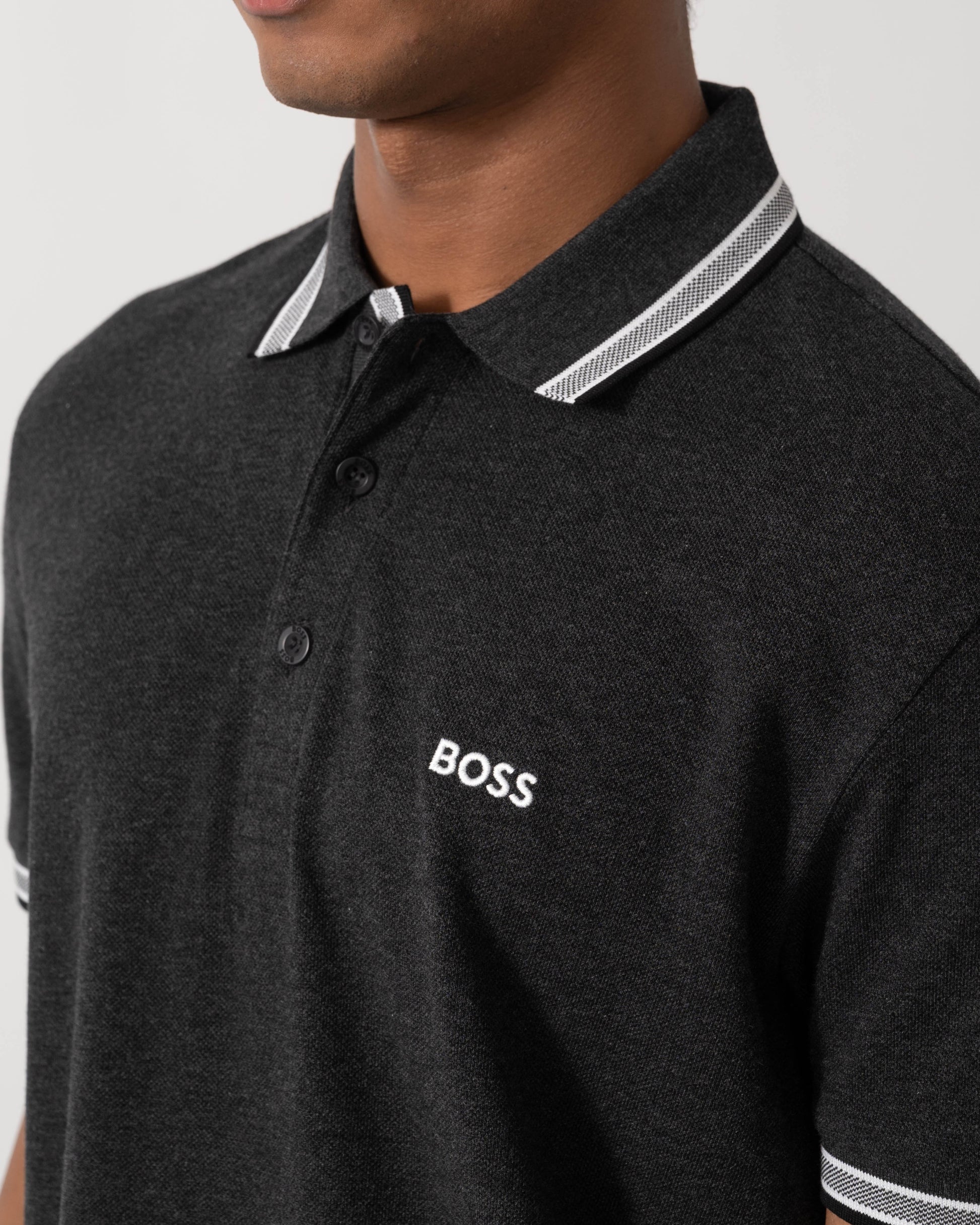 Close up of BOSS Green Paddy Mens Cotton-Piqué Polo Shirt with Contrast Logo - Dark Grey 022