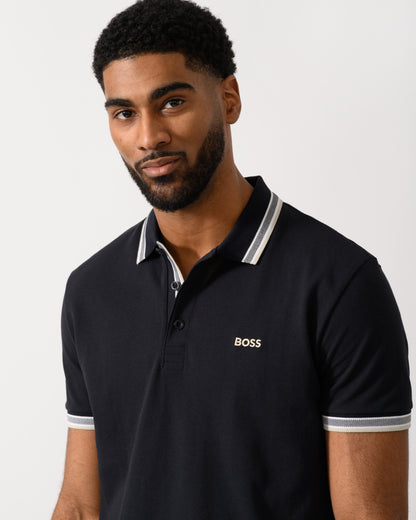 detail shot of a Model wearing a BOSS Green Paddy Mens Cotton-Piqué Polo Shirt with Contrast Logo in Medium Blue