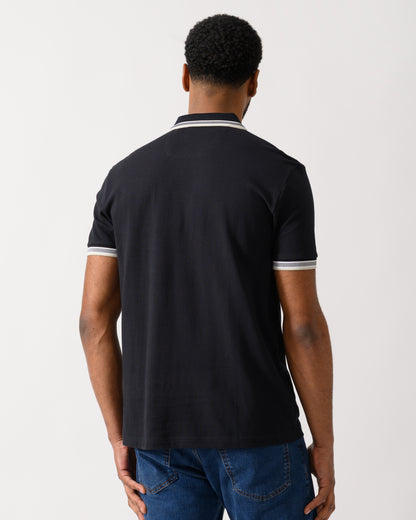 back shot of a Model wearing a BOSS Green Paddy Mens Cotton-Piqué Polo Shirt with Contrast Logo in Medium Blue