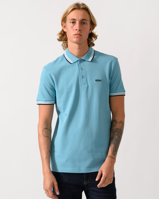 studio photograph of a model wearing a BOSS Green Paddy Mens Cotton-Piqué Polo Shirt with Contrast Logo in Open Blue 486