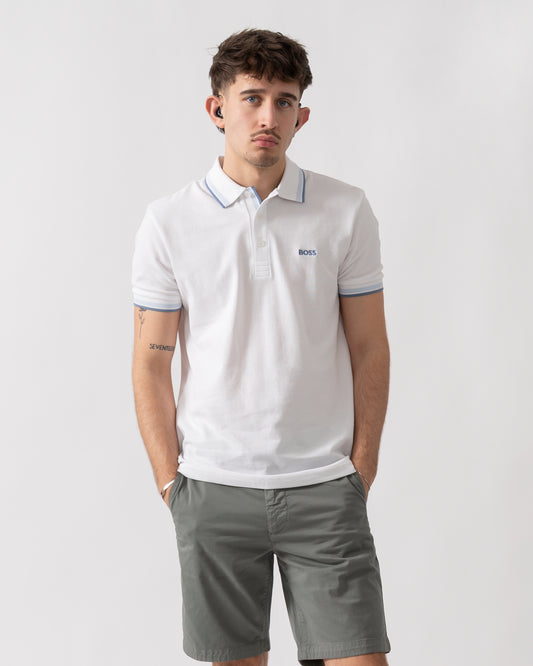 studio shot of a model wearing a BOSS Green Paddy Mens Cotton-Piqué Polo Shirt with Contrast Logo in Open White 115