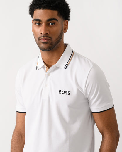 close up shot of a model wearing a BOSS Green Paddy Pro Mens Cotton Blend Polo Shirt With Contrast Logos in Natural 103 colour
