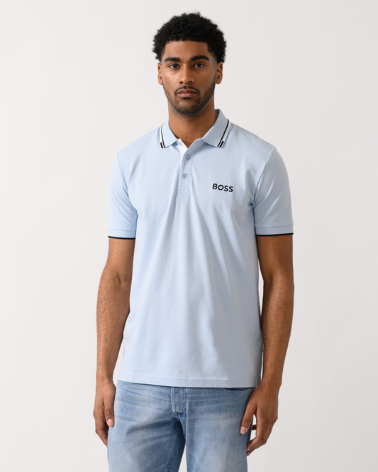 model wearing a BOSS Green Paddy Pro Mens Cotton Blend Polo Shirt With Contrast Logos in Open Blue 460