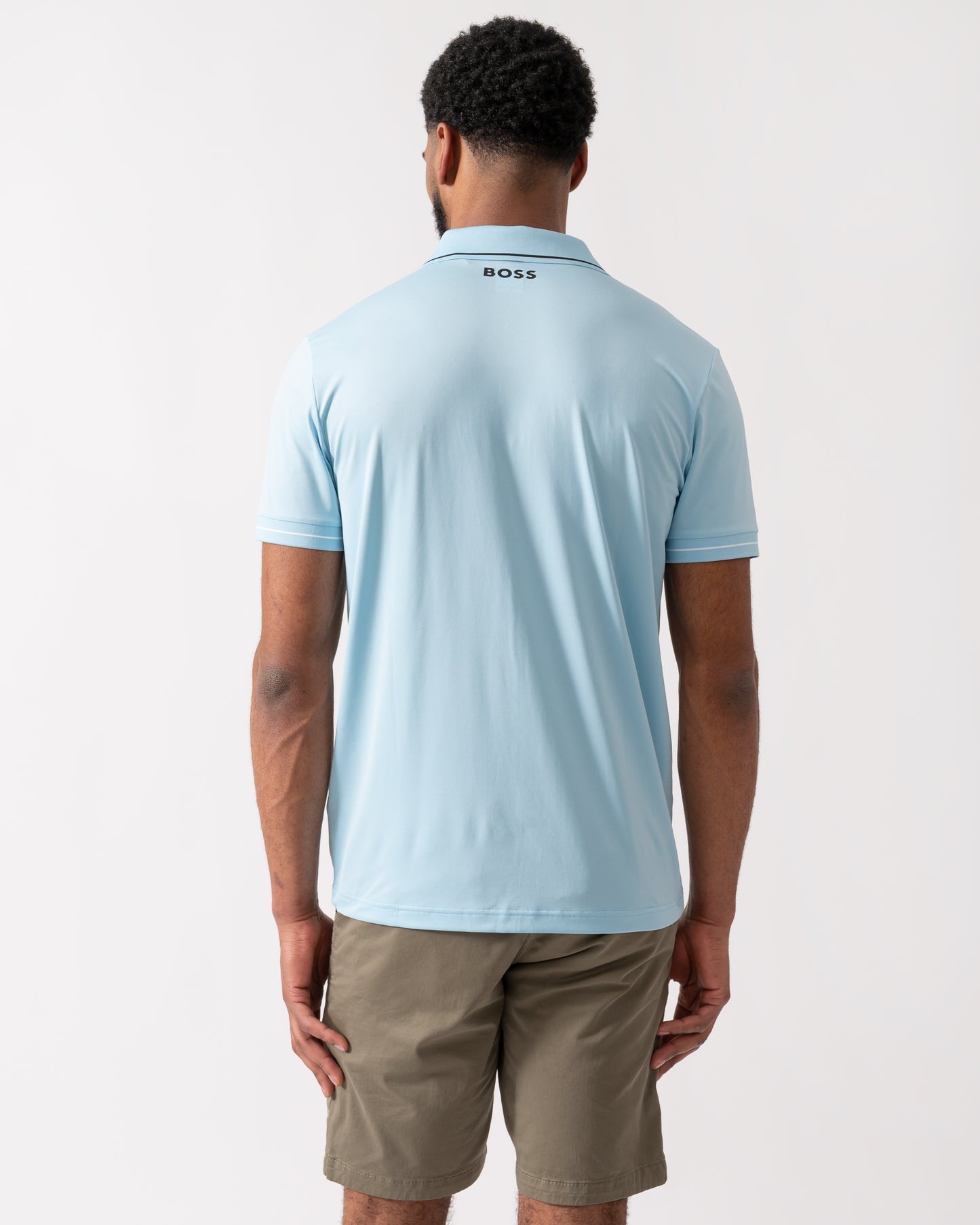 back of a model wearing a BOSS Green Paul Pro Mens Tipped Polo Shirt in Light Pastel Blue
