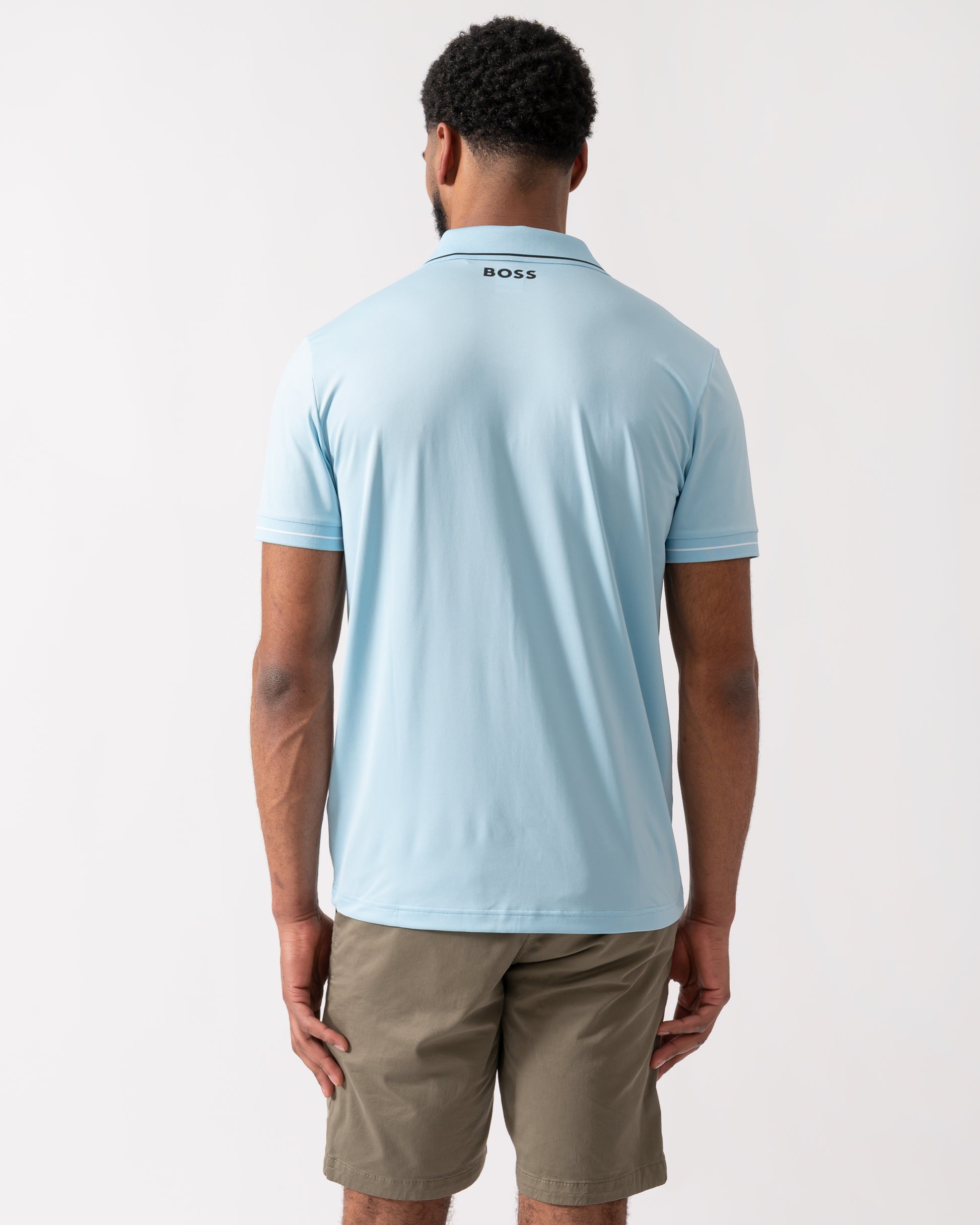 back of a model wearing a BOSS Green Paul Pro Mens Tipped Polo Shirt in Light Pastel Blue