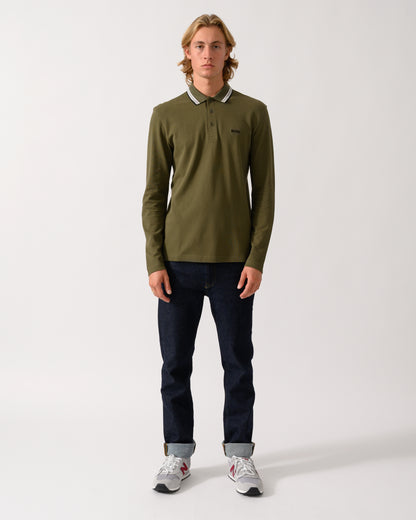 full length of a model wearing a BOSS Green Plisy Mens Long Sleeve Polo Shirt in Open Green 398