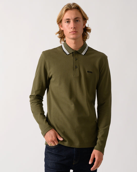 model wearing a BOSS Green Plisy Mens Long Sleeve Polo Shirt in Open Green 398