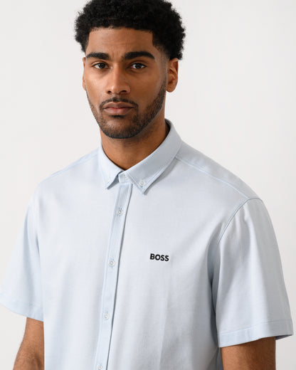 close up shot of a model wearing a BOSS Green ST_Motion Mens Short Sleeve Shirt in Open Blue 460