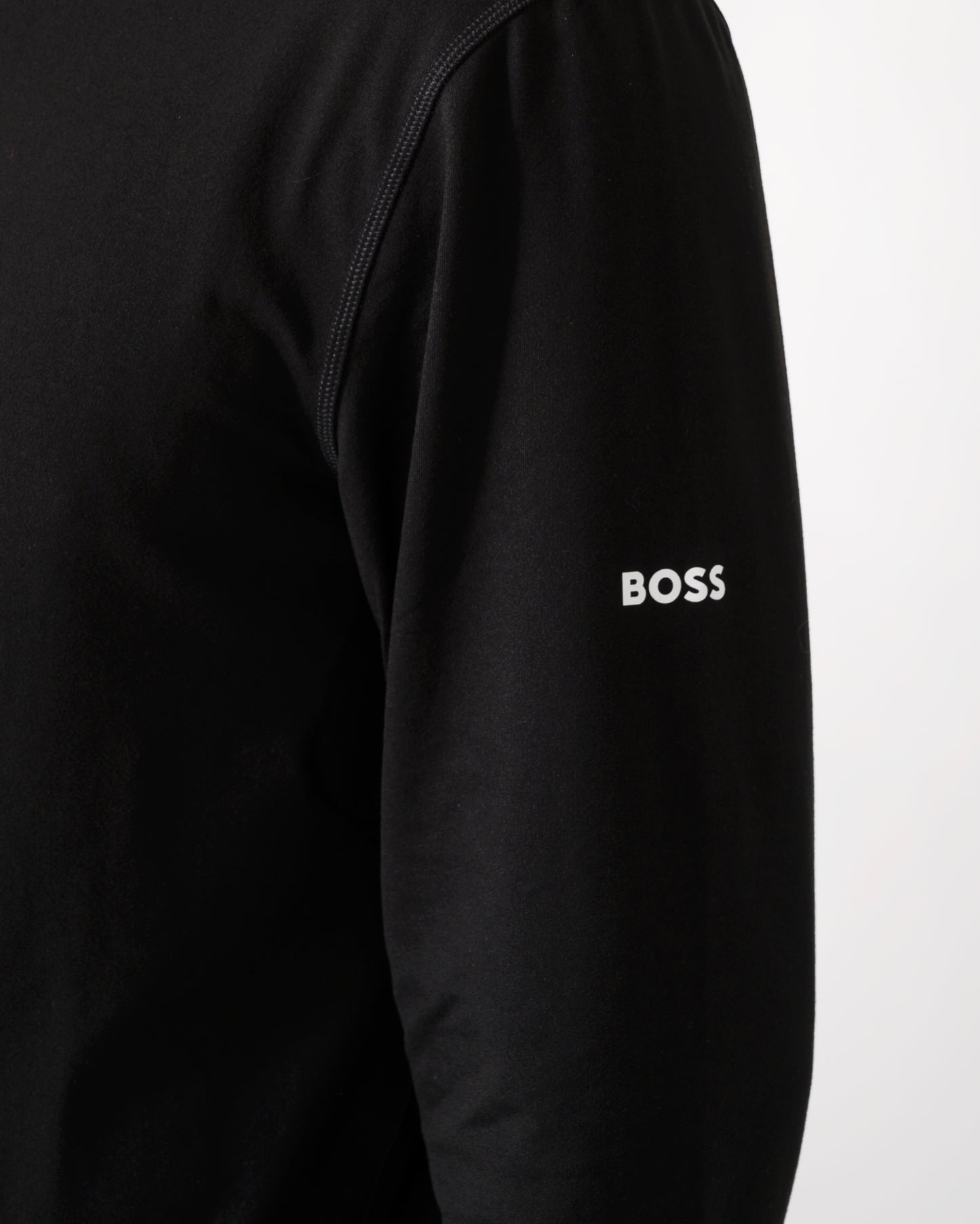 logo detail shot of model wearing a BOSS Green SW Active Mens Quarter Zip Sweatshirt in Black 001