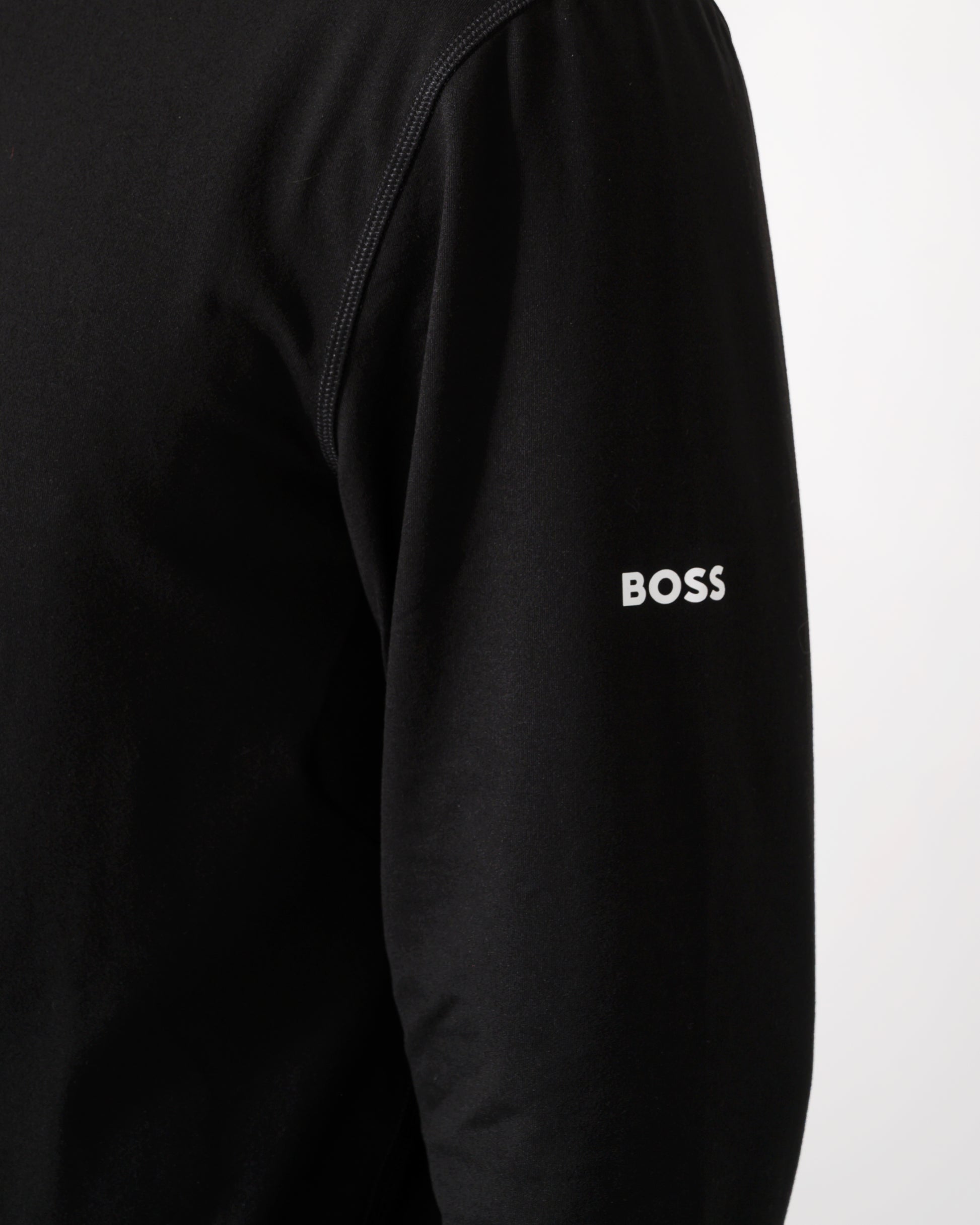 logo detail shot of model wearing a BOSS Green SW Active Mens Quarter Zip Sweatshirt in Black 001