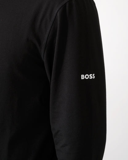 logo detail shot of model wearing a BOSS Green SW Active Mens Quarter Zip Sweatshirt in Black 001