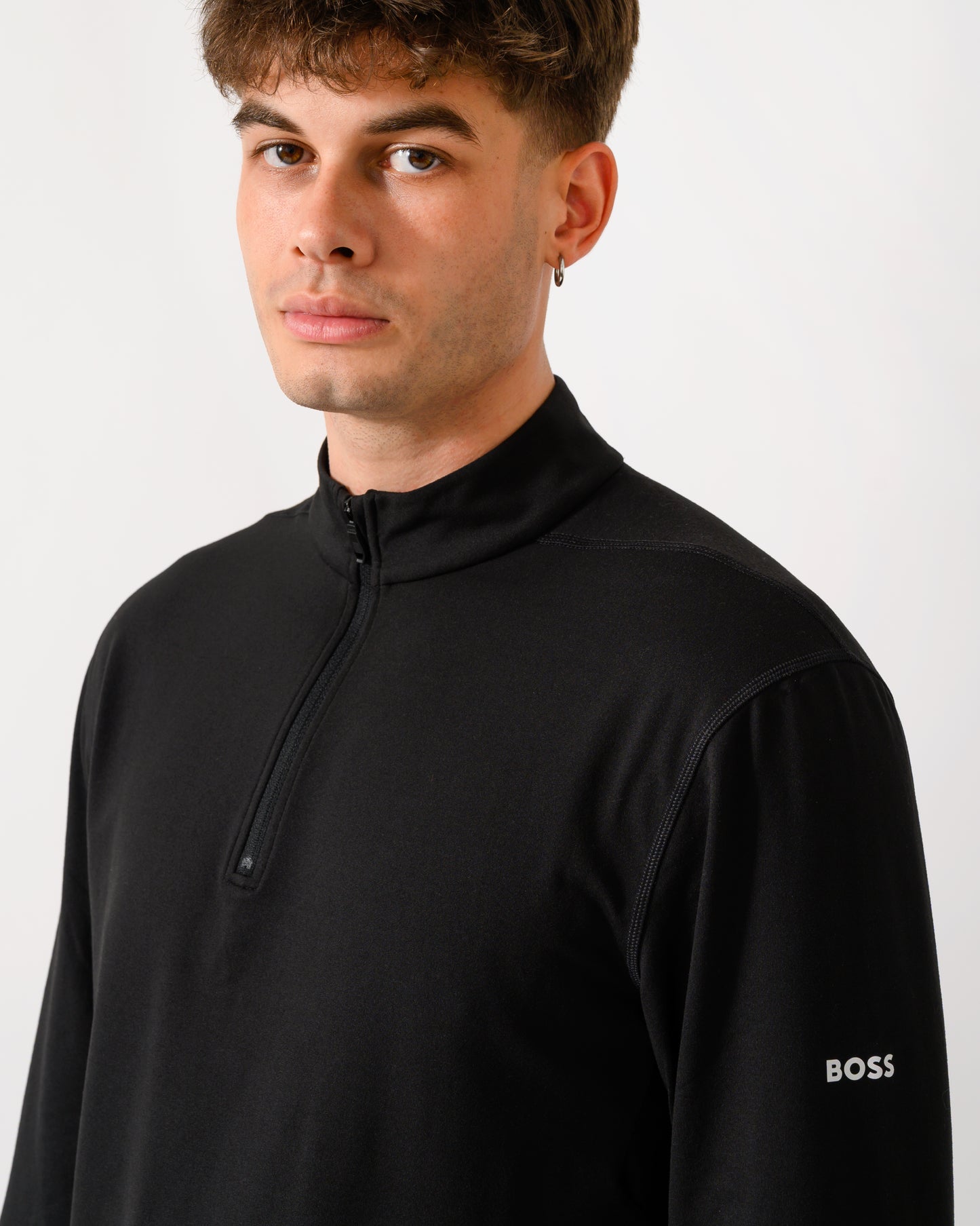 close up shot of model wearing a BOSS Green SW Active Mens Quarter Zip Sweatshirt in Black 001