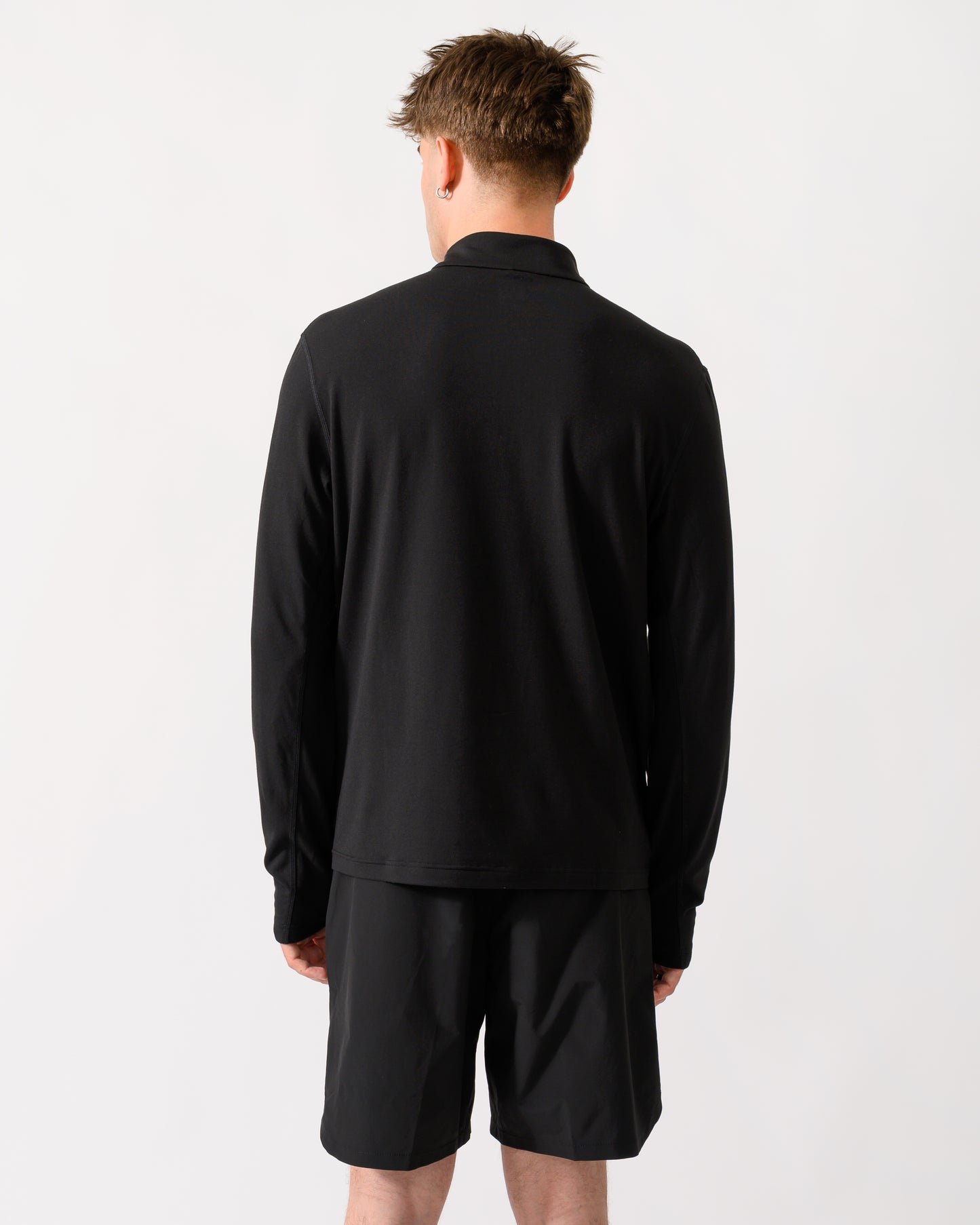 back shot of model wearing a BOSS Green SW Active Mens Quarter Zip Sweatshirt in Black 001