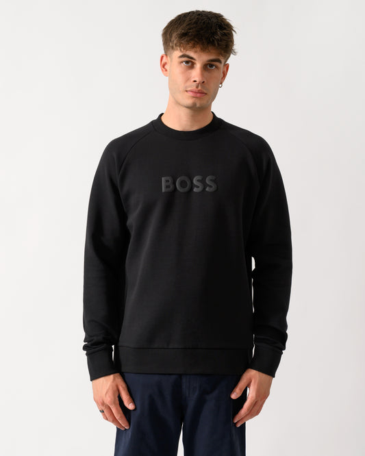 model wearing a BOSS Green Salbo Mens Crew Neck Sweatshirt with Tonal Logo in Black 001