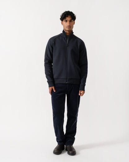 Man wearing BOSS Green Skaz Mens Full Zip Funnel Neck Sweatshirt with Tonal Logo - Dark Blue 402