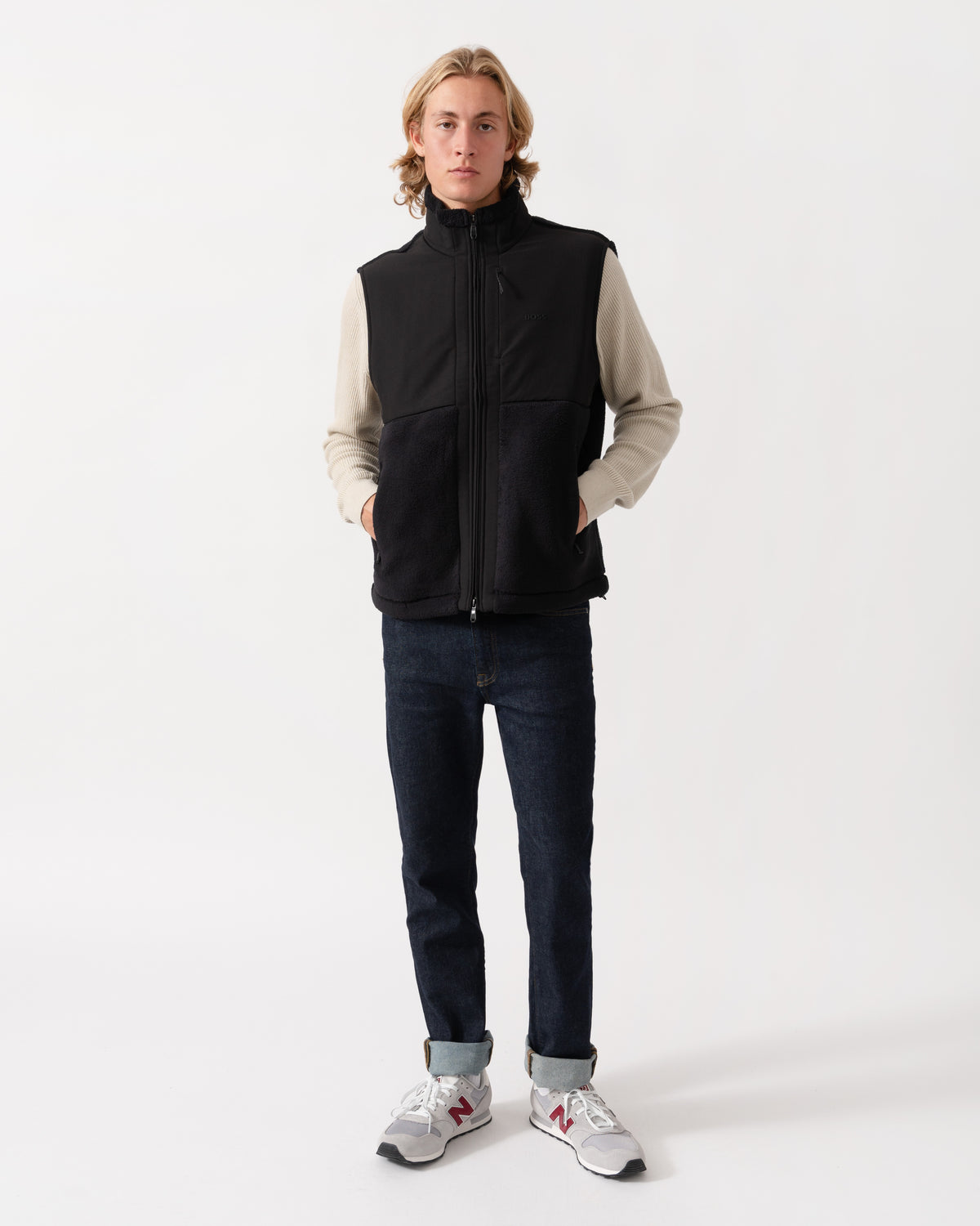 Model wearing the BOSS Green Sveedy Mens Contrast-panel teddy fleece gilet with logo  - Black 001