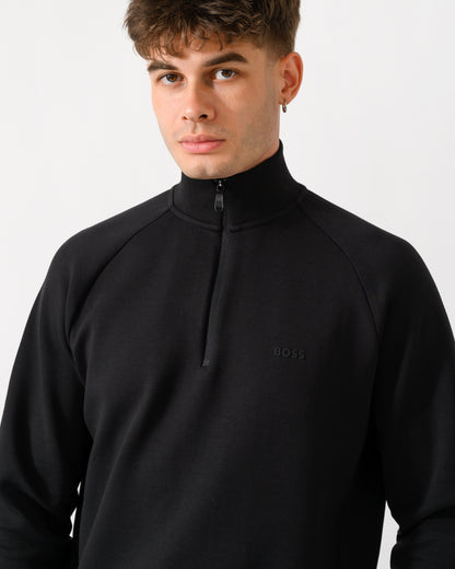 close up shot of a model wearing a BOSS Green Sweat Mens 1/4 Zip Sweatshirt in Black 001
