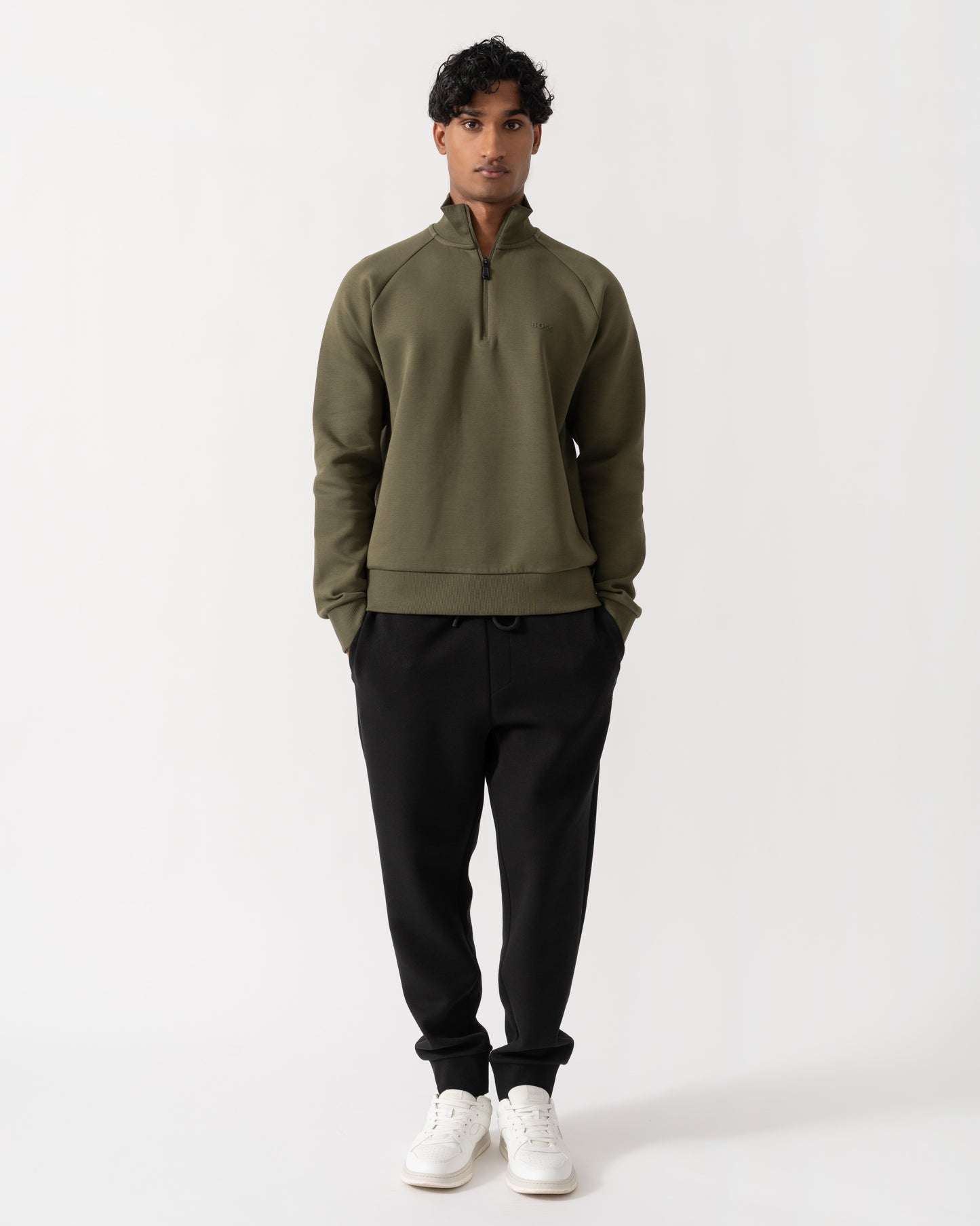 Man wearing BOSS Green Sweat Mens 1/4 Zip Sweatshirt 50565306 - Open Green 398