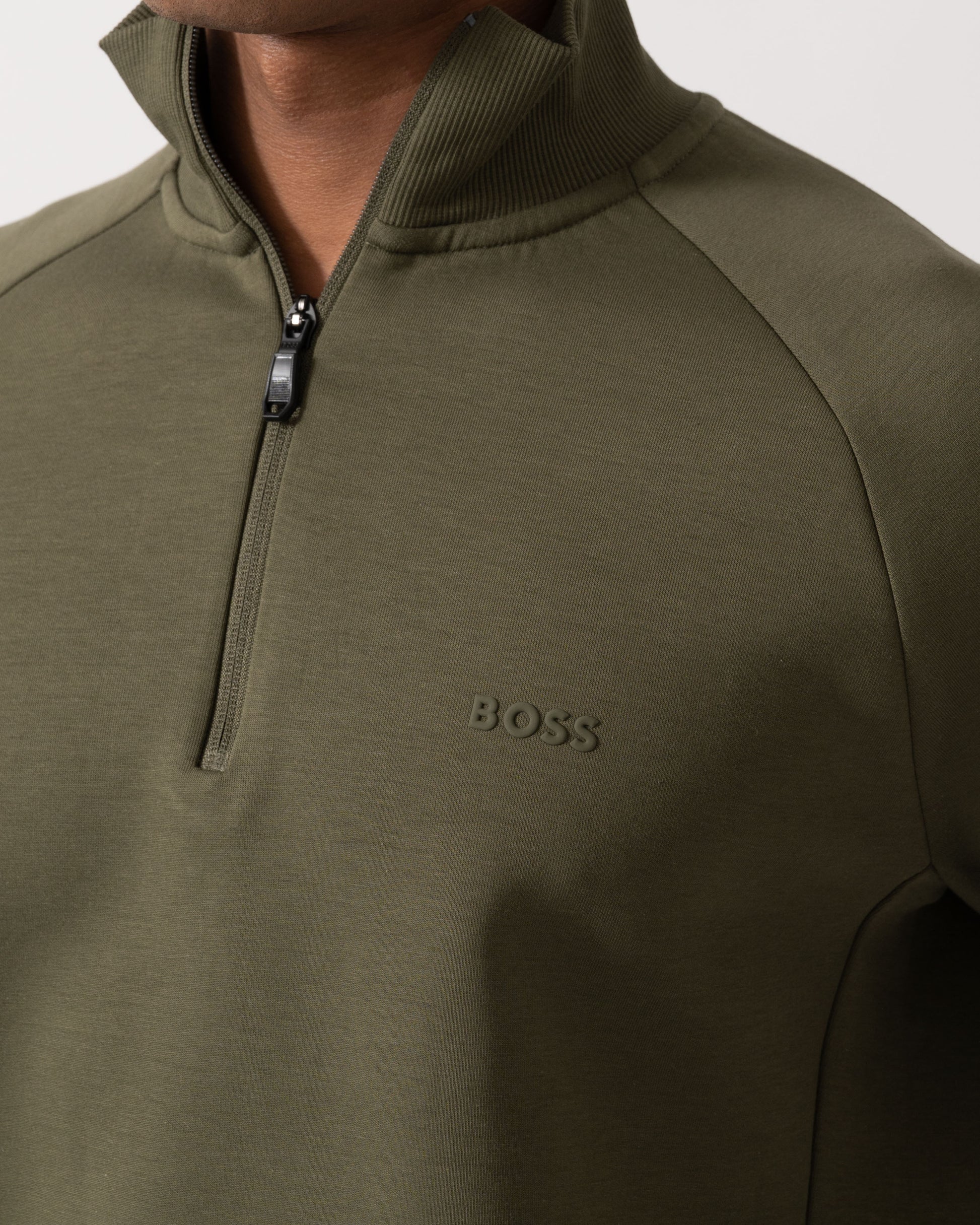 Logo and zip detail of BOSS Green Sweat Mens 1/4 Zip Sweatshirt 50565306 - Open Green 398