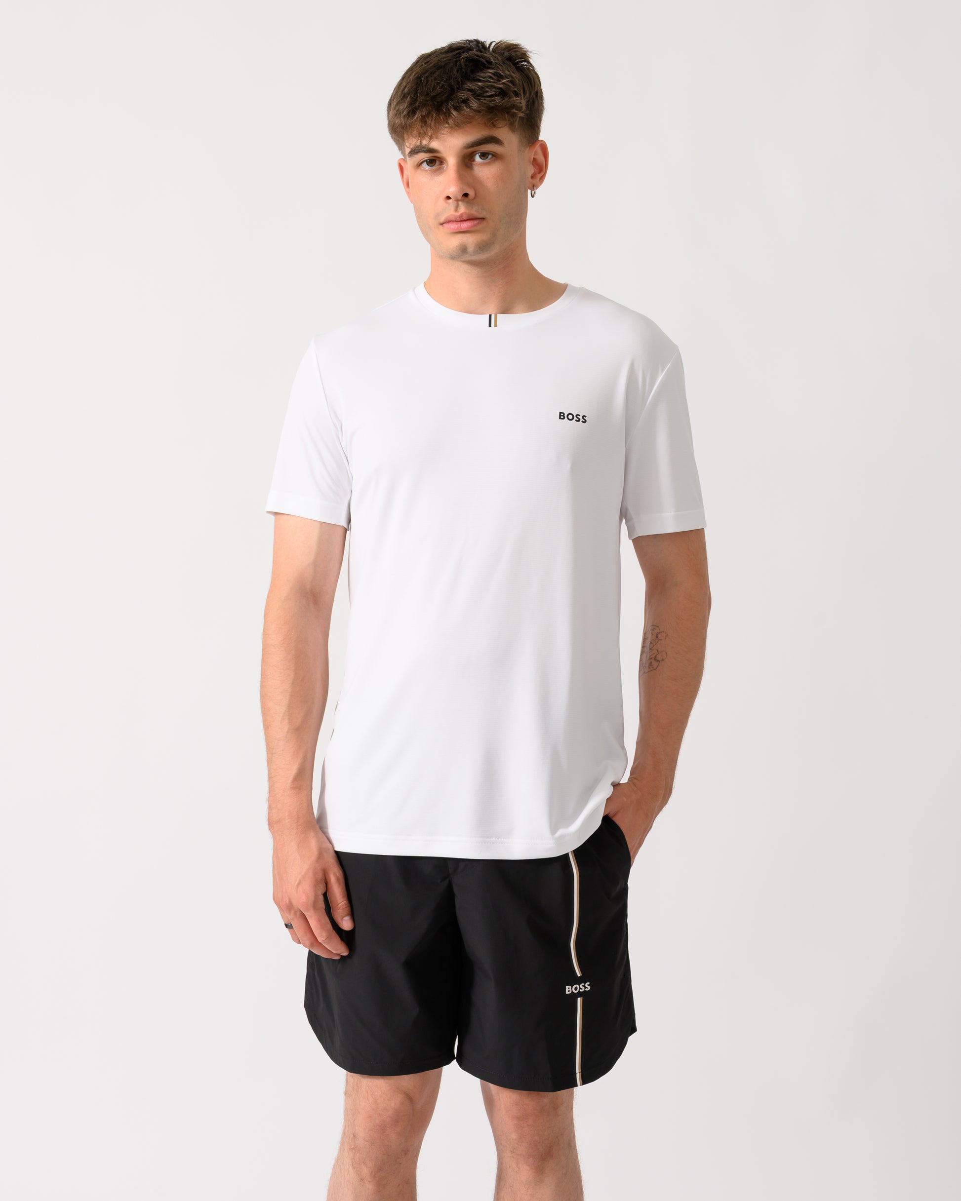 model wearing a BOSS Green TOC Game Mens T-Shirt in White 100