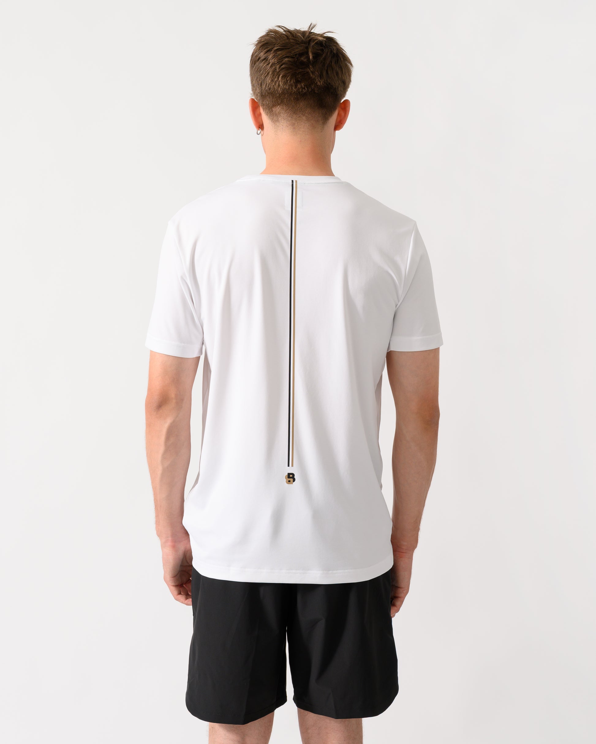 back shot of a model wearing a BOSS Green TOC Game Mens T-Shirt in White 100