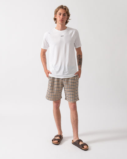 full length shot of a Model wearing a BOSS Green Tee Active Mens T-Shirt in White 100