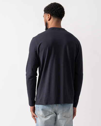 back of a model wearing a BOSS Green Tee Mens Stretch-Cotton T-Shirt with Contrast Logo in Dark Blue