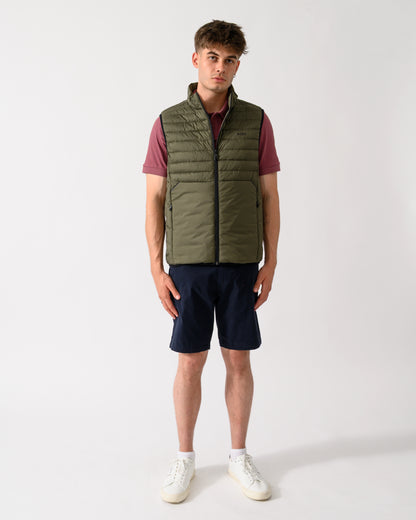 full length shot of a model wearing a BOSS Green Urbanex Mens Gilet in Open Green 398