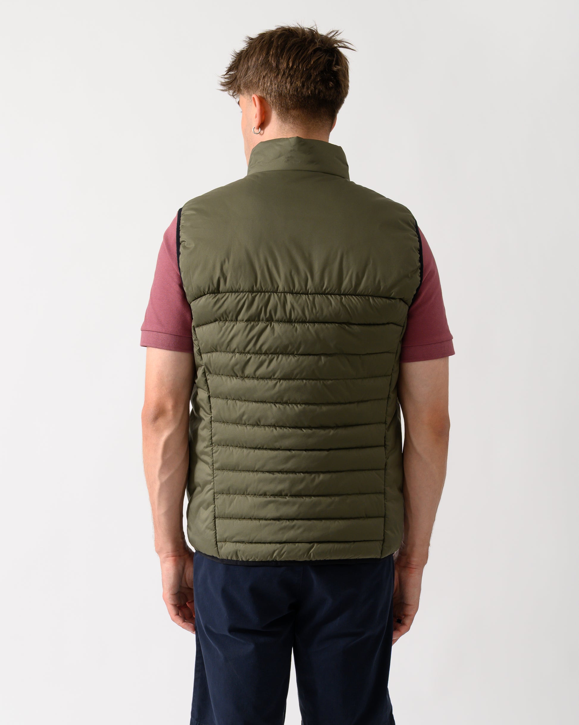 back shot of a model wearing a BOSS Green Urbanex Mens Gilet in Open Green 398