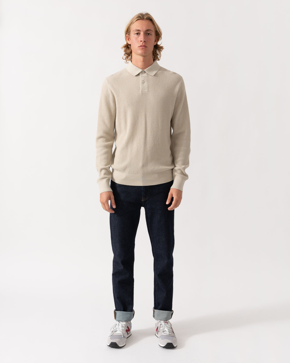 Model wearing the BOSS Orange Afedro Mens Long Sleeve Knit Polo Shirt - Light Beige 271