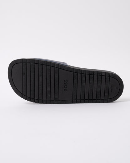 sole of BOSS Orange Aryeh Mens Italian-Made Slides With Large Logo Detail in Dark Blue 406