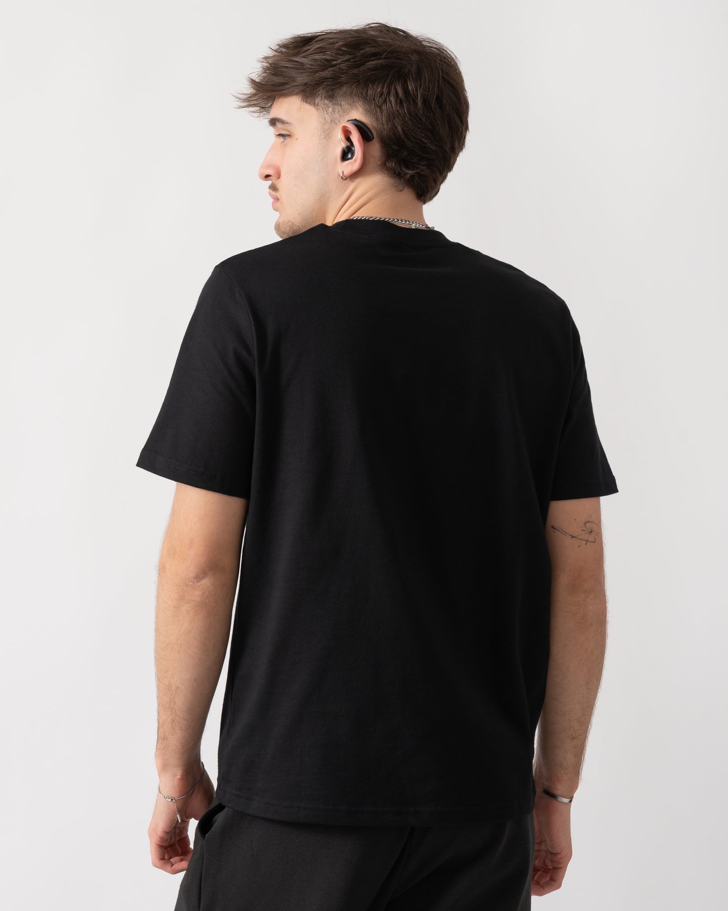 back shot of a model wearing a BOSS Orange Authentic Mens Loungewear T-Shirt in Black 004
