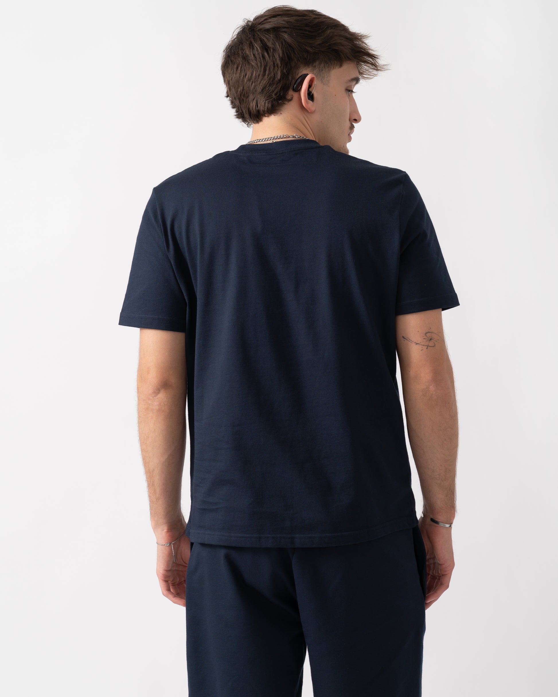 back shot of a model wearing a BOSS Orange Authentic Mens Loungewear T-Shirt in Dark Blue 405
