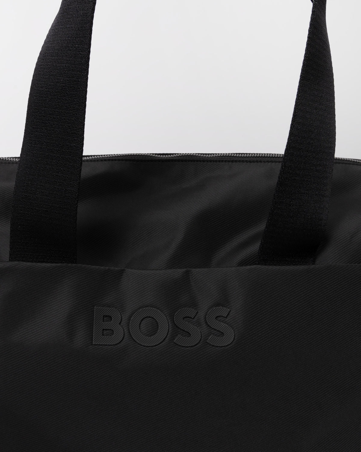 Logo detail of the BOSS Orange Catch 3.0 Mens Holdall 50567750 - Black 001