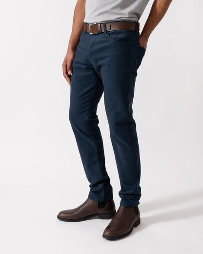 Detail shot of a Model wearing a pair of BOSS Orange Delaware Mens Jeans in Open Blue