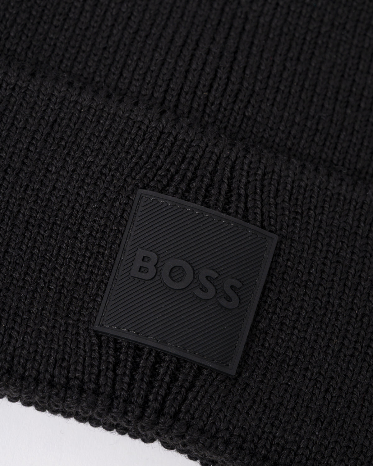 logo detail of a BOSS Orange Foxxy Mens Tonal Logo Beanie in Black 001
