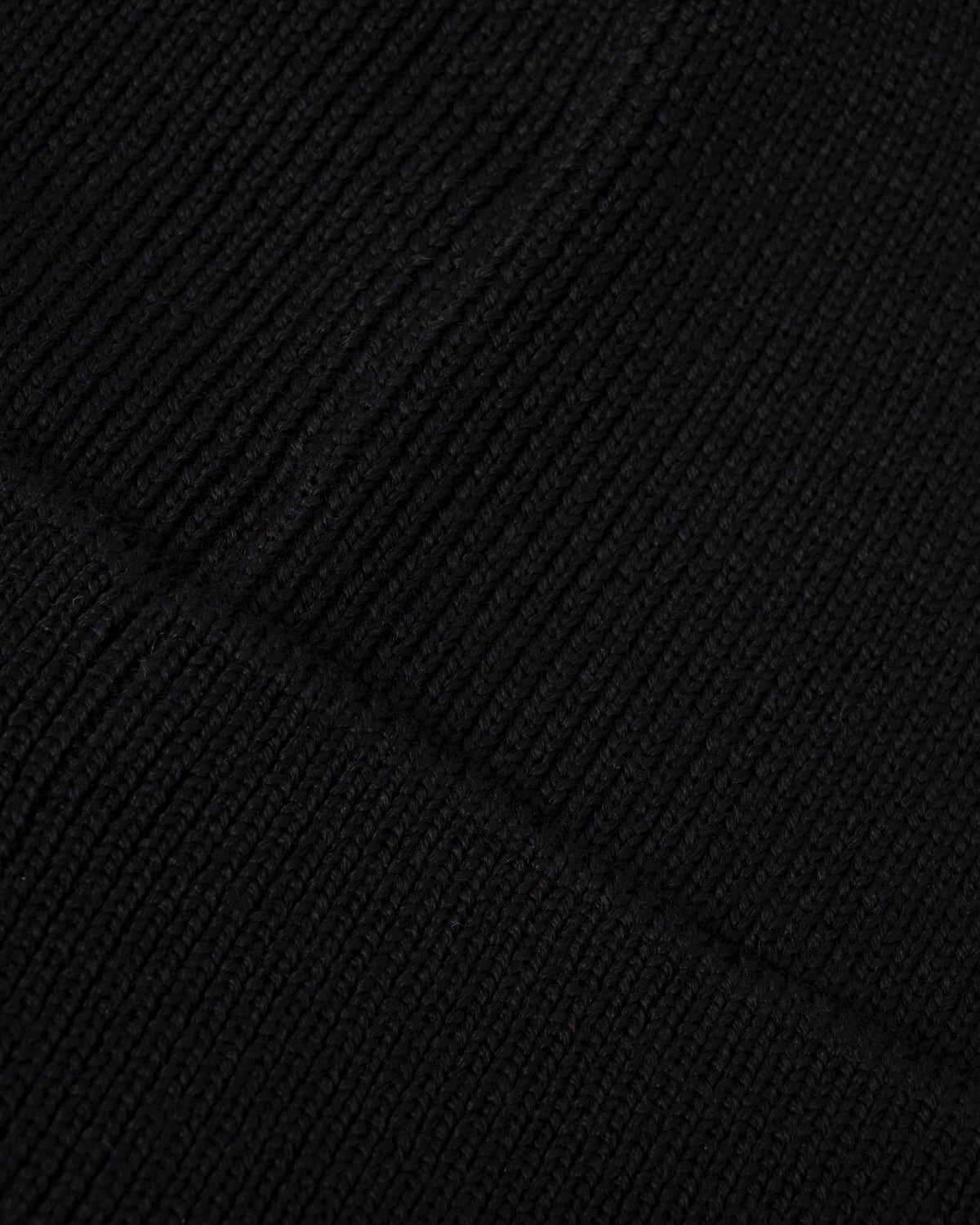 texture detail of a BOSS Orange Foxxy Mens Tonal Logo Beanie in Black 001