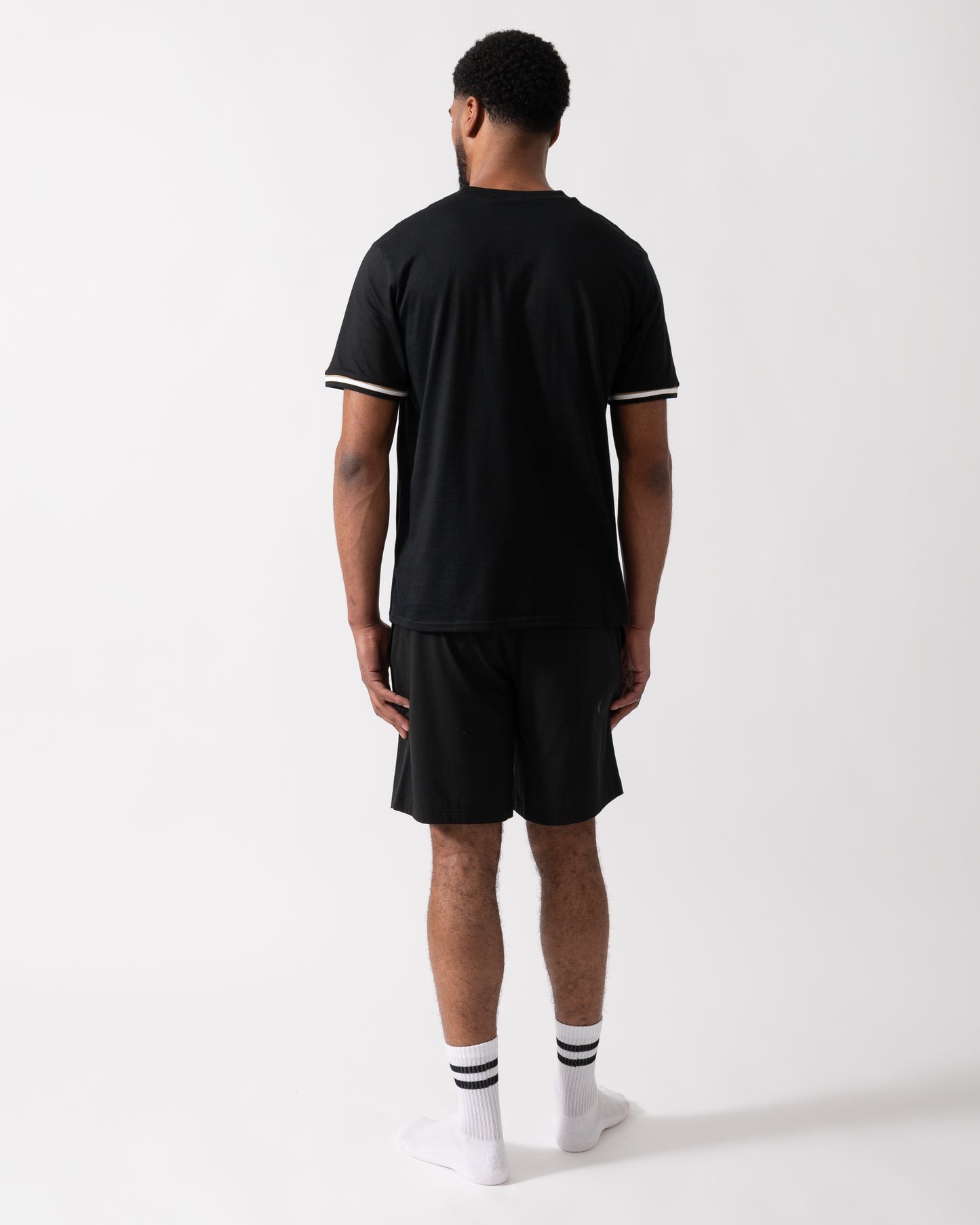 Back shot of a Model wearing a BOSS Orange Iconic Mens Loungewear T-Shirt in Black