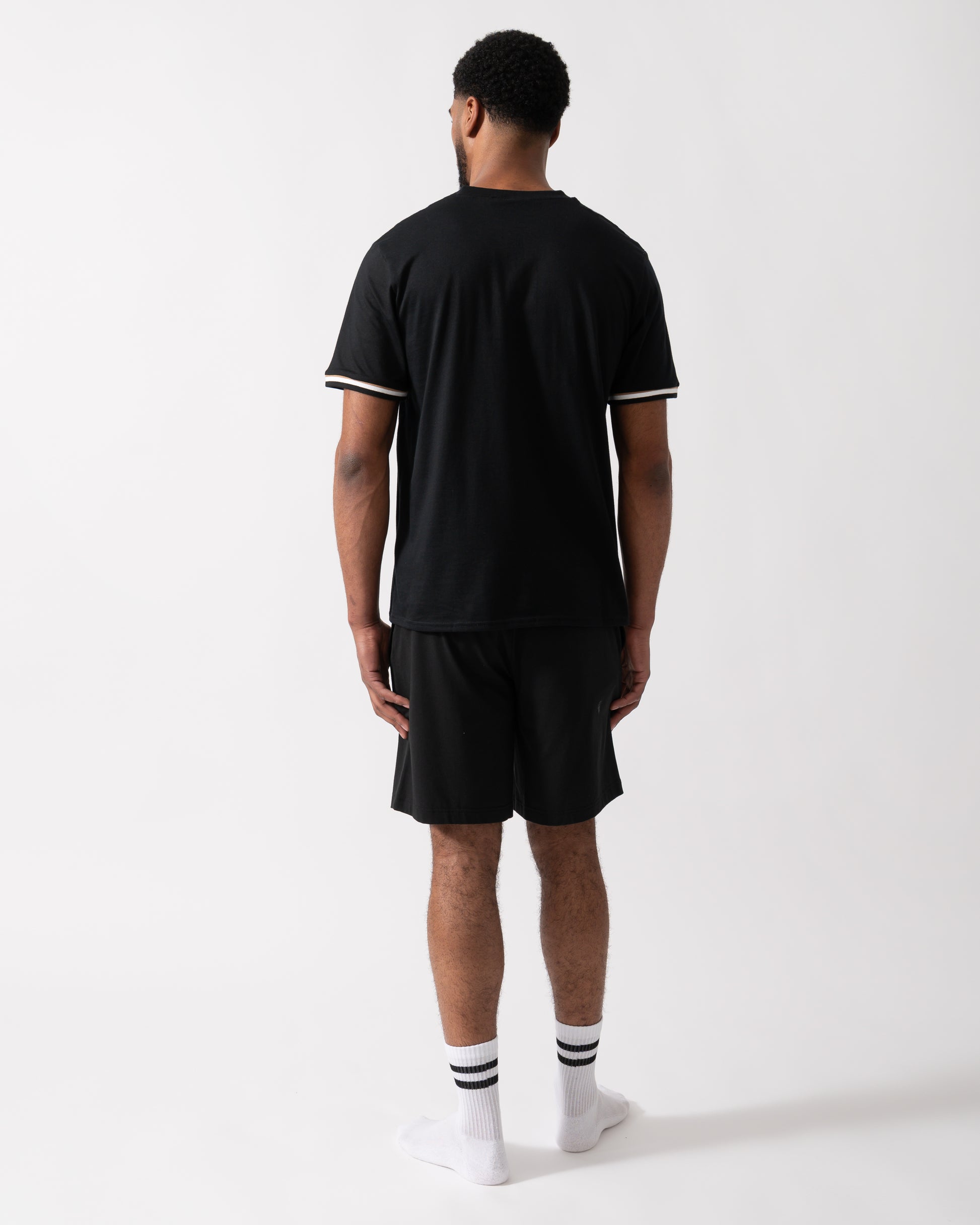 Back shot of a Model wearing a BOSS Orange Iconic Mens Loungewear T-Shirt in Black