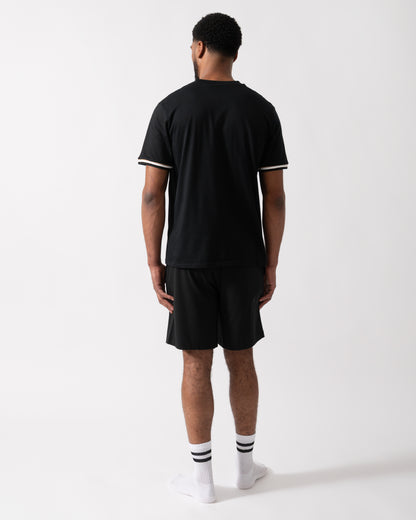 Back shot of a Model wearing a BOSS Orange Iconic Mens Loungewear T-Shirt in Black