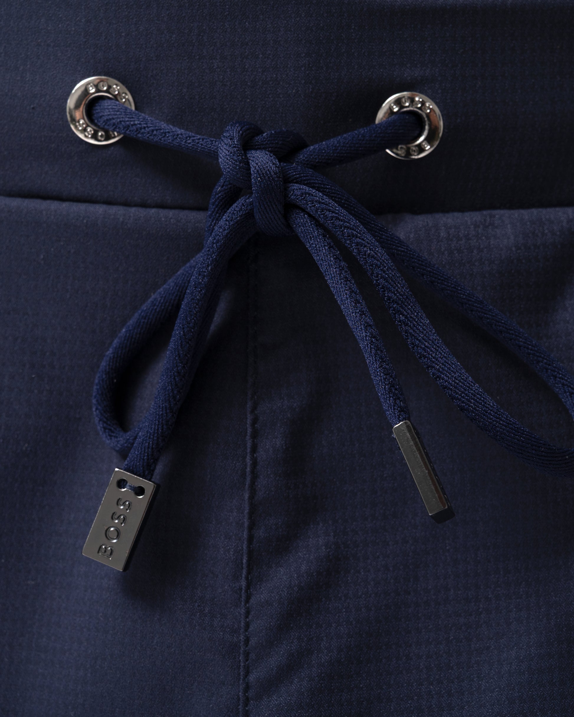 detail of BOSS Orange Isle Mens Ripstop-Fabric Swim Shorts with Contrast Logo in Navy 413