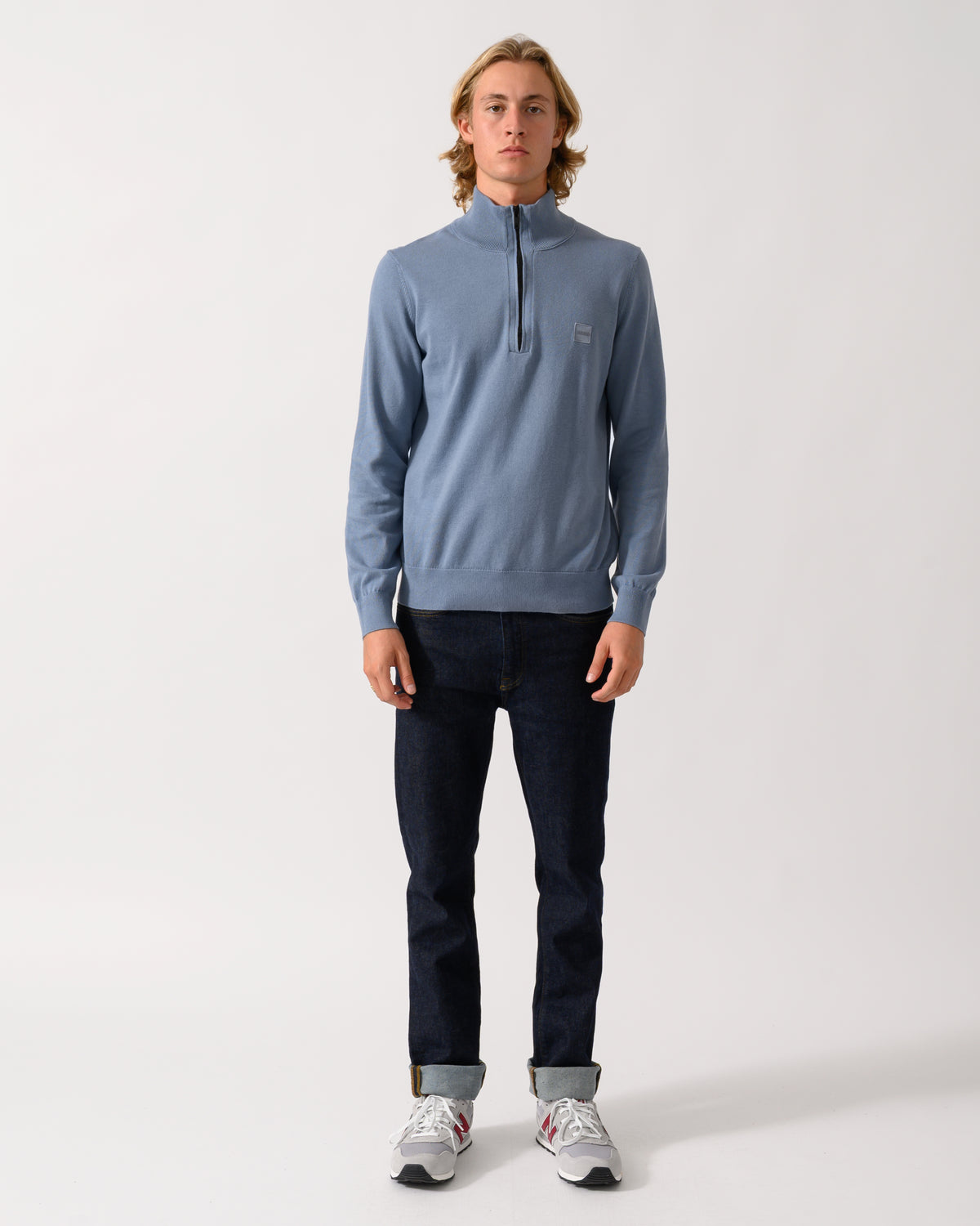full length of a model wearing a BOSS Orange Kanobix S Mens 1/4 Zip Jumper in Medium Blue 424