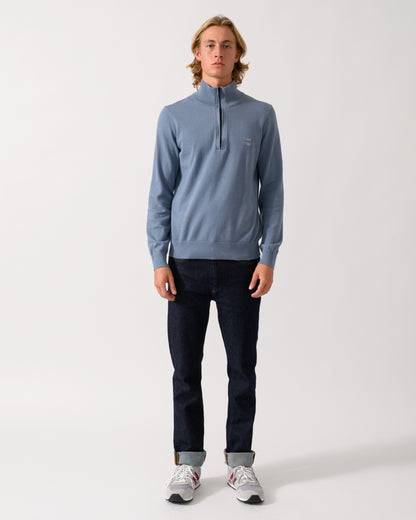 full length of a model wearing a BOSS Orange Kanobix S Mens 1/4 Zip Jumper in Medium Blue 424