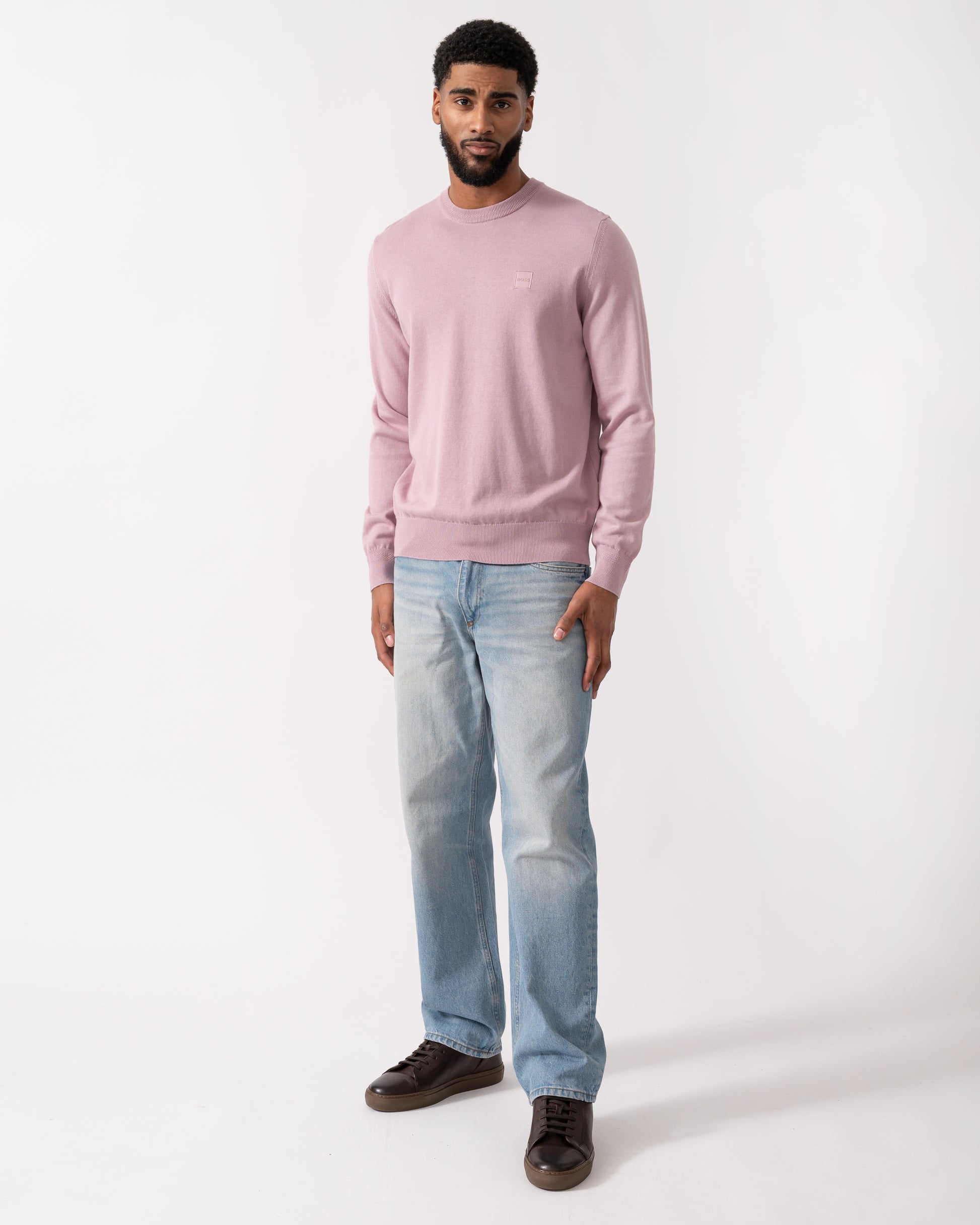 full length of a model wearing a BOSS Orange Kanovano Mens Crew Neck Jumper in Light Pastel Purple
