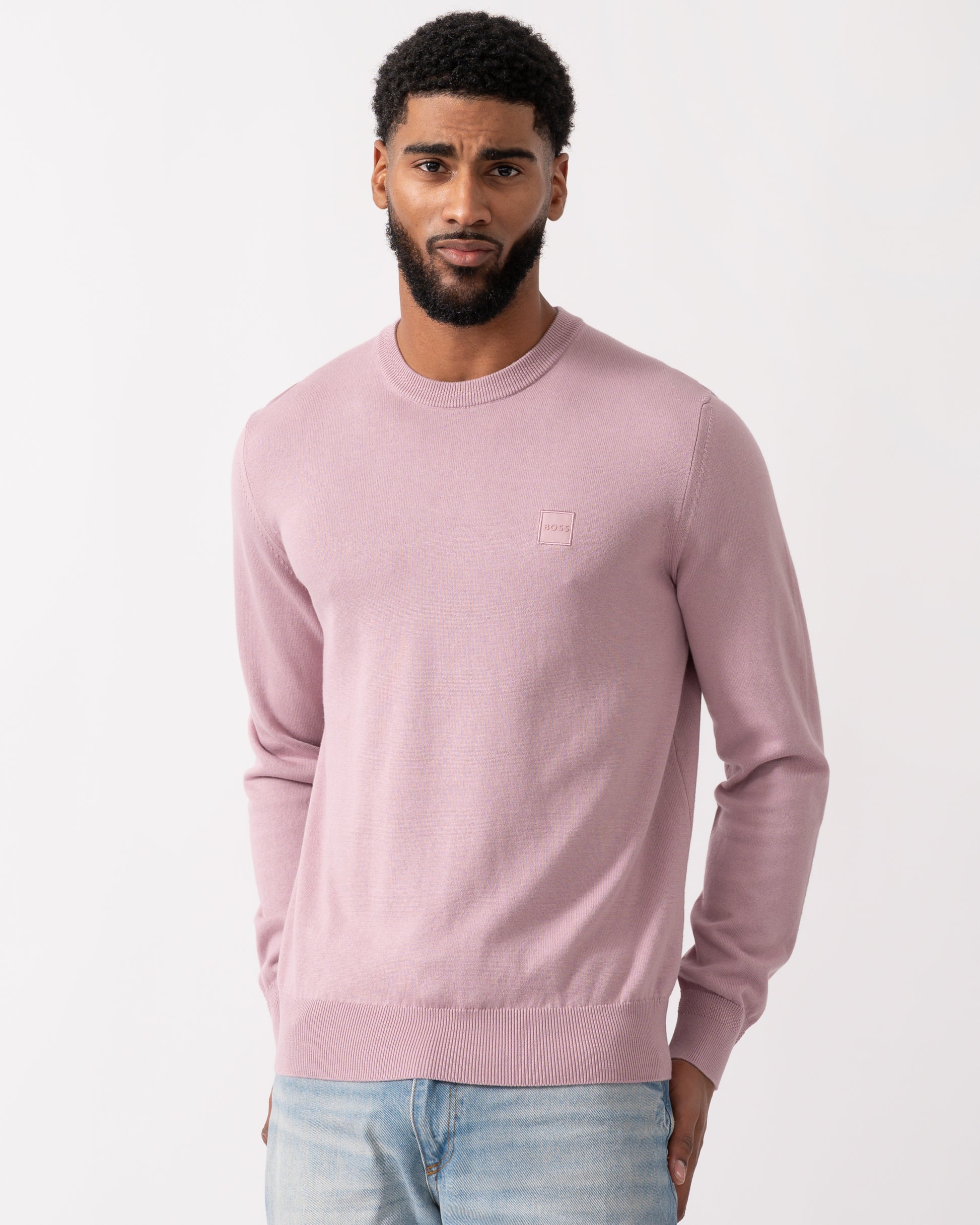 model wearing a BOSS Orange Kanovano Mens Crew Neck Jumper in Light Pastel Purple